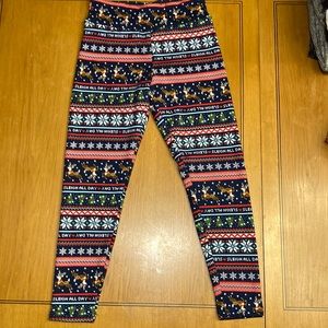 Women’s Fleece lined Holiday Leggings. Size L (11-13). NWT